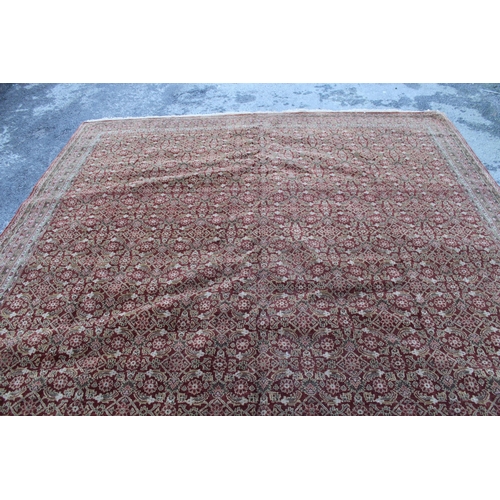 13 - Large Kashmir carpet with an all-over Herati design on a brick red ground with borders, 3.6m x 2.75m... 