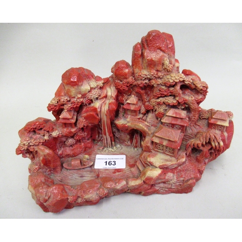 163 - Resin model of an oriental mountain waterfall with various buildings, 26cms wide