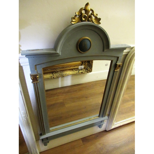 1734 - Modern French grey painted and gilded wall mirror having arched top with carved surmount above a rec... 