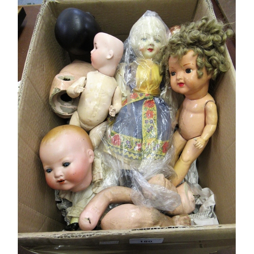 180 - Box containing a collection of various 19th Century bisque headed dolls, having papier mache jointed... 