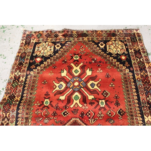 20 - Modern South West Persian rug with a triple medallion and all-over stylised floral and bird design o... 