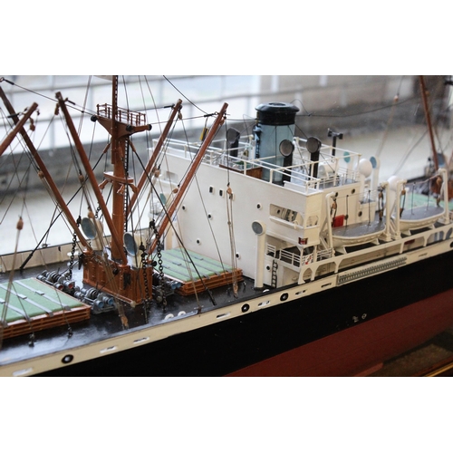 210 - Scale model of Eumaeus 7.308GT built Baltimore 1943 in a mahogany and glazed display case, 43cms hig... 