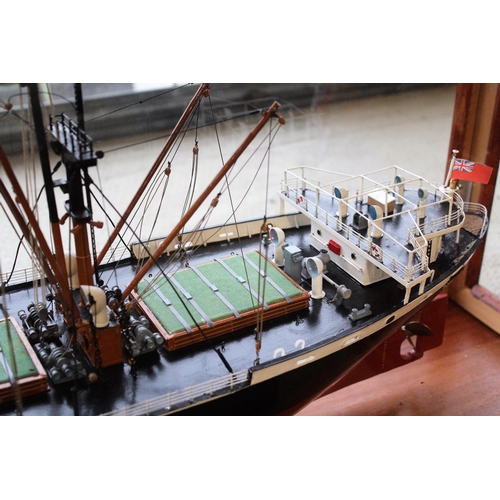 210 - Scale model of Eumaeus 7.308GT built Baltimore 1943 in a mahogany and glazed display case, 43cms hig... 