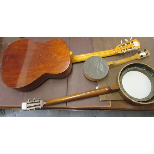 245 - Tatra classical guitar (at fault), a banjo and ukulele banjo (at fault)