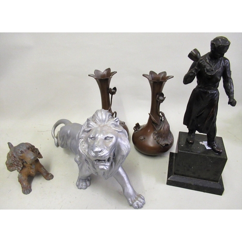 259 - Painted metal figure of a lion, painted metal table lighter in the form of dog and a brown patinated... 