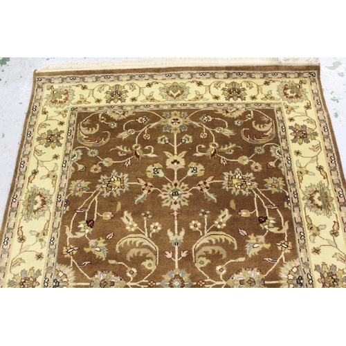 38 - Small Indo Persian rug with an all-over stylised floral design in shades of beige and cream, 181 x 1... 