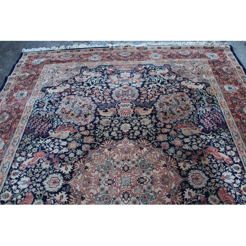 54 - Large Kashan machine woven carpet in Persian style, 273cms x 370cms