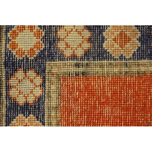 57 - Indo Persian rug of twin medallion design with multiple borders on a red brick ground, (some wear) 2... 