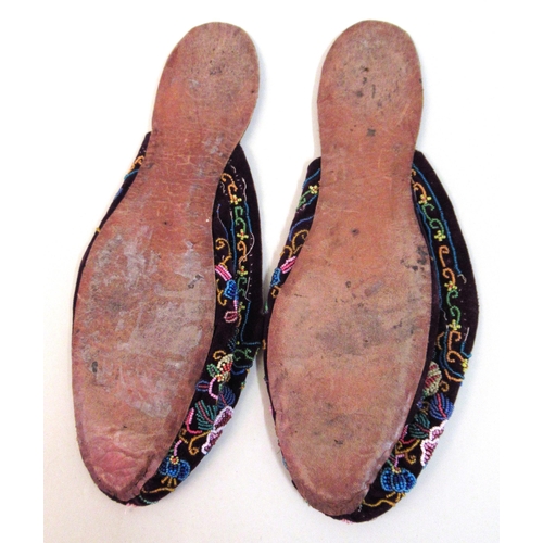 61 - Pair of antique beadwork slippers, together with a Chinese silk embroidered sleeve panel, 54cms x 10... 