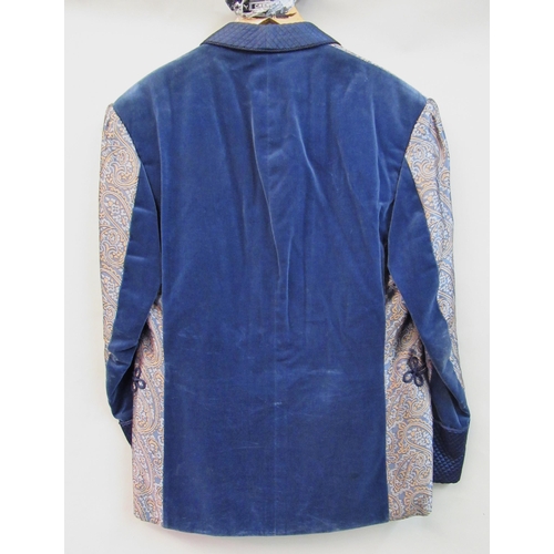 63 - Tommy Nutter, Savile Row, London, gentleman's blue velvet smoking jacket with silk brocade to front ... 