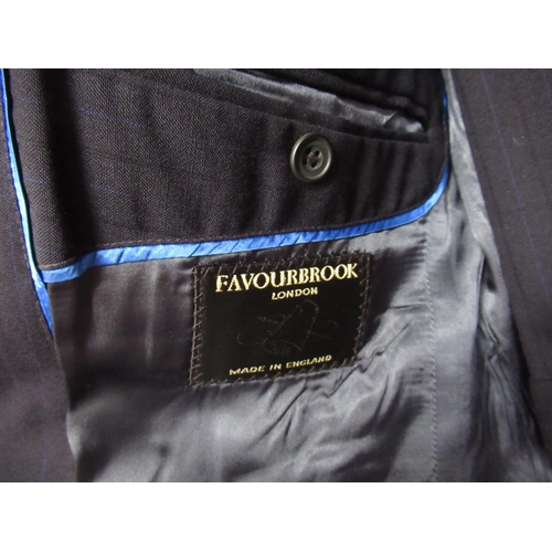 72 - Favourbrook, London, gentleman's two piece navy blue suit, size 40, together with a pin striped suit... 