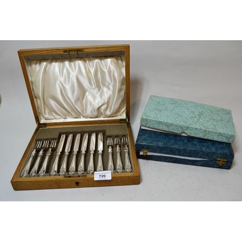 720 - Oak cased set of six plated dessert knives and forks, with two other sets of plated flatware, boxed