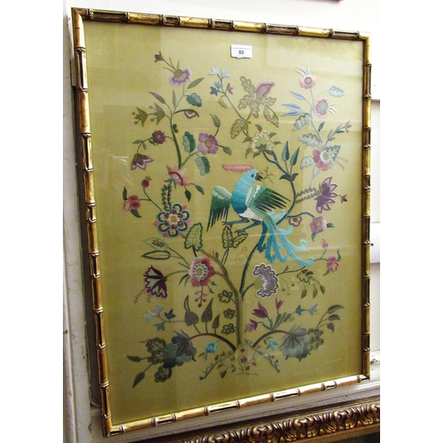 80 - Silkwork picture of a bird in foliage, in a faux bamboo gilded frame, 70cms x 52cms