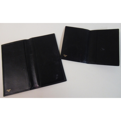 88A - Must de Cartier, black leather wallet with authentication certificate No. CL403961, together with an... 