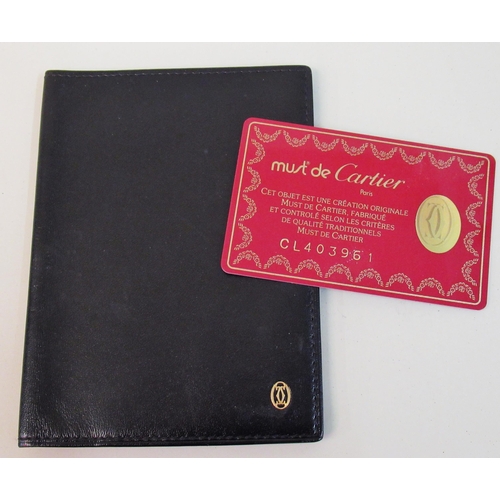 88A - Must de Cartier, black leather wallet with authentication certificate No. CL403961, together with an... 