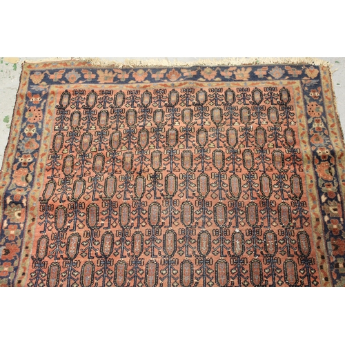 9 - Antique Hamadan rug with an all-over Boteh design on a rose ground with borders, 195cms x 123cms app... 