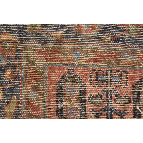 9 - Antique Hamadan rug with an all-over Boteh design on a rose ground with borders, 195cms x 123cms app... 