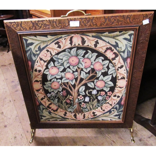 96 - Early 20th Century oak firescreen inset with an Indian silk, metal thread and sequin picture of peac... 