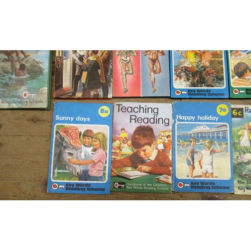 423 - Box containing a quantity of various children's books, including Biggles, Ladybird etc.