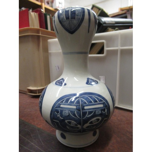 590 - Chinese blue and white stoneware vase of waisted baluster form, 25.5cms high, together with a modern... 