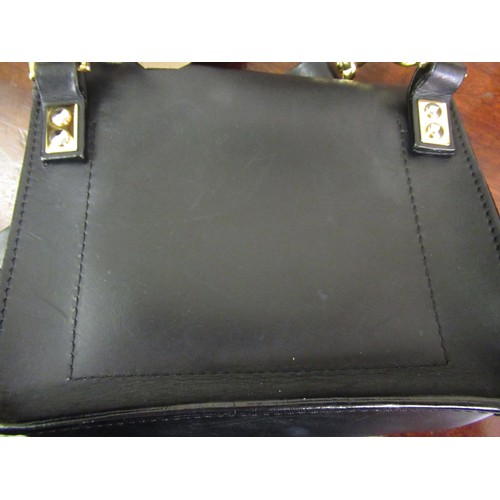 93 - Sophie Hulme Mini Envelope black leather cross body bag with original dust cover, together with a Re... 