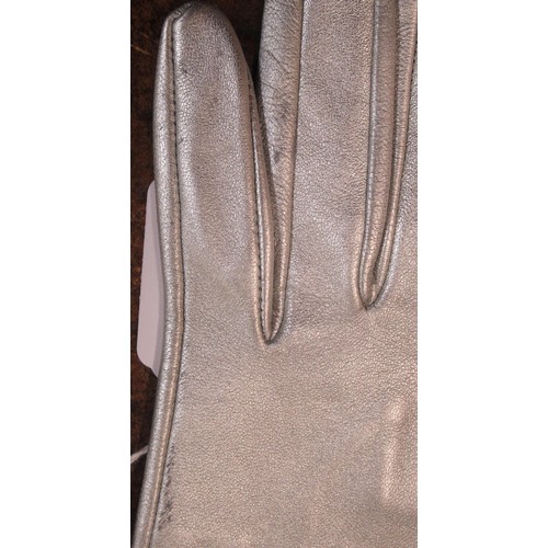 112 - Pair of Causse ladies silvered leather gloves