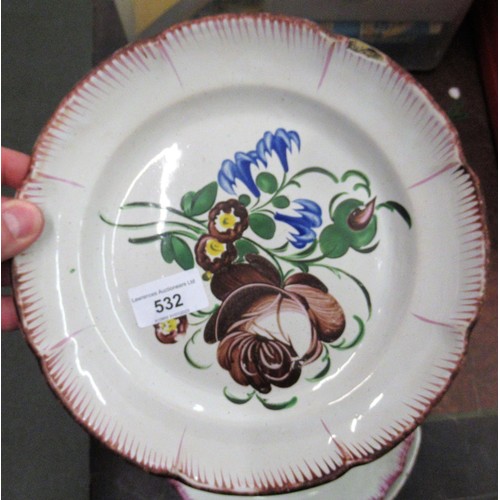 532 - Quantity of various tin glazed floral decorated plates