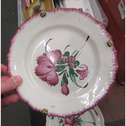 532 - Quantity of various tin glazed floral decorated plates