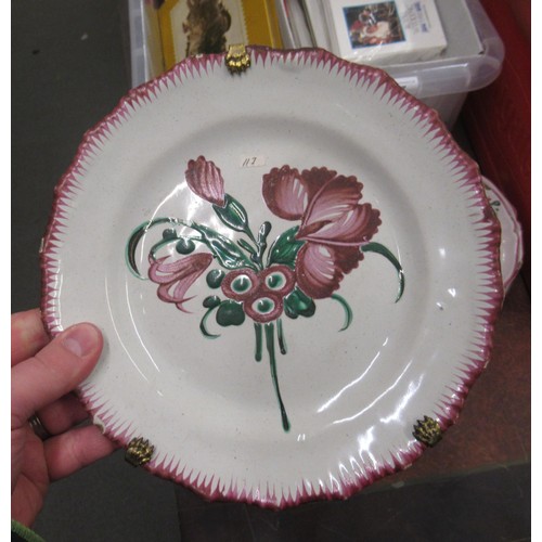 532 - Quantity of various tin glazed floral decorated plates