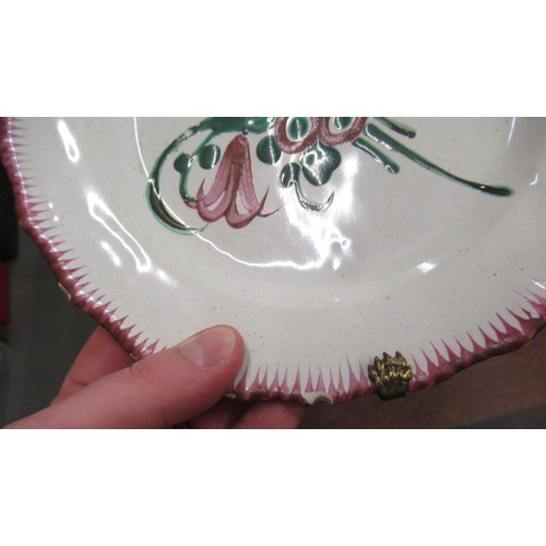 532 - Quantity of various tin glazed floral decorated plates