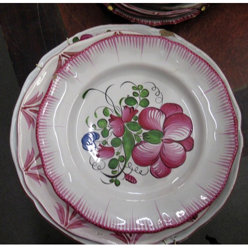 532 - Quantity of various tin glazed floral decorated plates