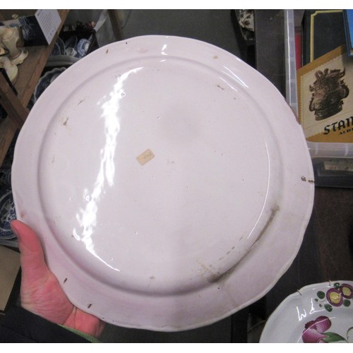 532 - Quantity of various tin glazed floral decorated plates