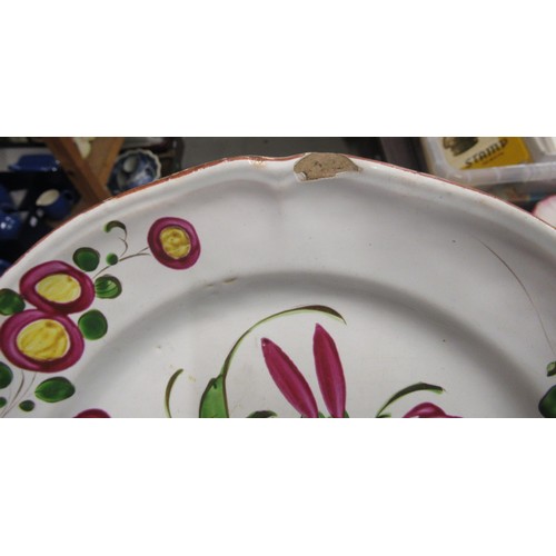 532 - Quantity of various tin glazed floral decorated plates