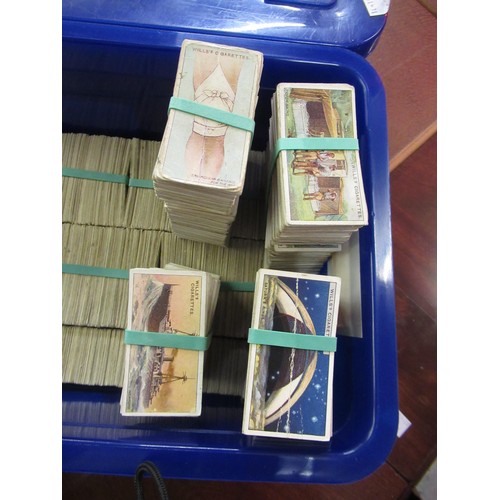 146 - Two blue boxes containing a large collection of various Wills, odd cigarette cards, including milita... 