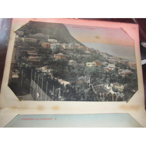 333 - Small Eastern lacquered postcard album containing views of Hong Kong and two painted postcards, toge... 