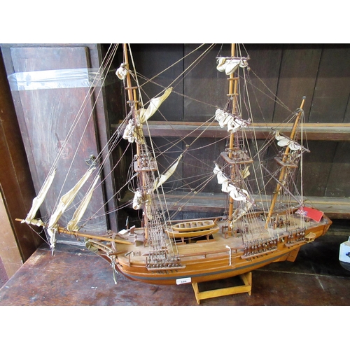 108 - Wooden model of a three masted ship on wooden stand, 72 x 87cms wide