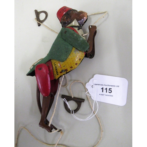 115 - Lehmann, Germany, lithographed tin plate clockwork toy in the form of a climbing monkey, 20cms long