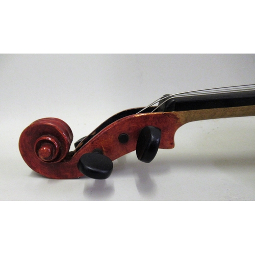 120B - 12.5in Student violin bearing labels with a bow, in an American case by Lifton