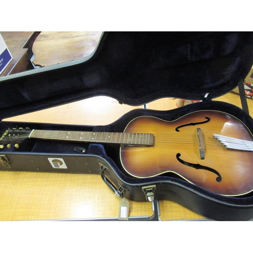 120E - Late 1950's arch top acoustic guitar by Hofner with later case (damage to neck heel)