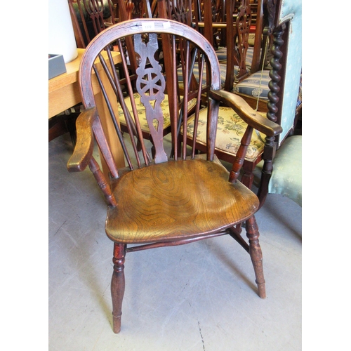 1372 - Late 19th / early 20th Century wheelback Windsor elbow chair, together with a mahogany oval swing fr... 