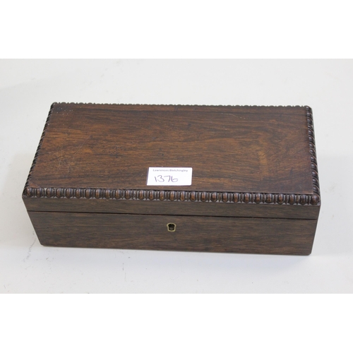 1376 - Regency mahogany line inlaid and brass mounted sarcophagus shaped tea caddy, the hinged cover enclos... 