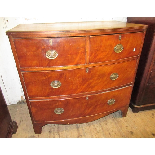 1383 - Small 19th Century mahogany bow front chest, the reeded top above two short and two long drawers wit... 