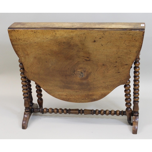 1388 - Victorian walnut Sutherland table, the shaped top with bobbin turned supports and stretchers, 90cms ... 