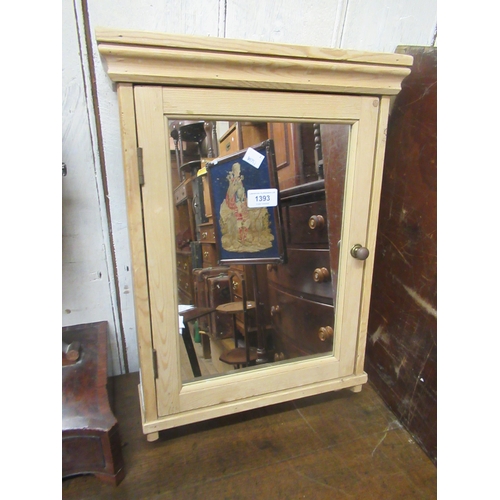 1393 - Small stripped pine wall cabinet with mirrored door, 54cms high x 37cms wide x 10cms deep