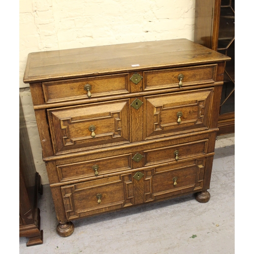 1395 - 18th Century oak two part chest of four long drawers, with geometric moulded fronts with original br... 