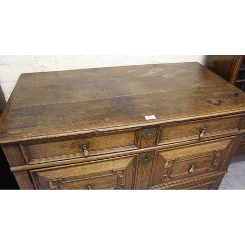 1395 - 18th Century oak two part chest of four long drawers, with geometric moulded fronts with original br... 