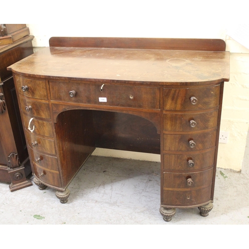 1396 - 19th Century mahogany semi bow front dressing table, the galleried back above an arrangement of twel... 