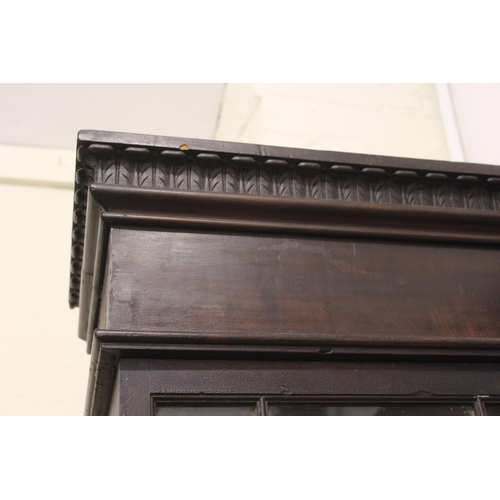 1397 - 19th Century mahogany bookcase, the moulded and carved cornice above two bar glazed doors enclosing ... 