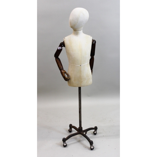 1407 - 20th Century antique style dressmaker's dummy with articulated wooden arms on metal stand