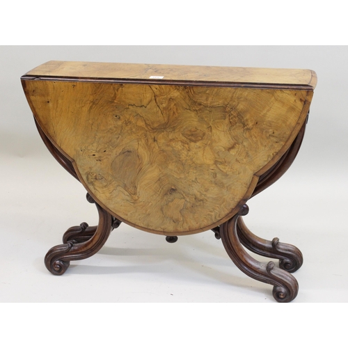 1416 - 19th Century walnut Sutherland table, the shaped oval top raised on unusual carved shaped gateleg su... 